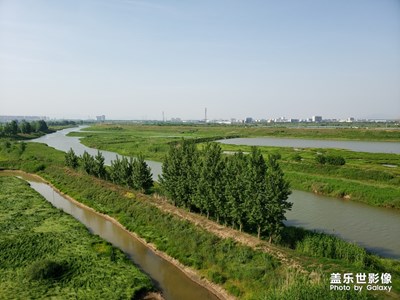 【玩轉(zhuǎn)五一】
九華河大橋上看九華河